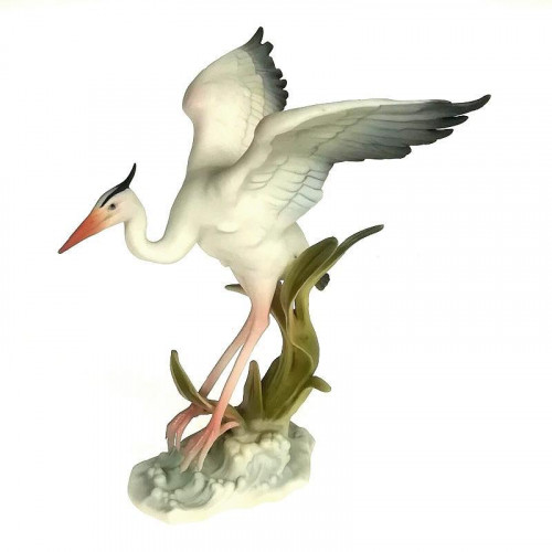 Hutschenreuther Kunstfigur en infallande häger - färgglansig matt h: 14 cm / b: 12 cm
